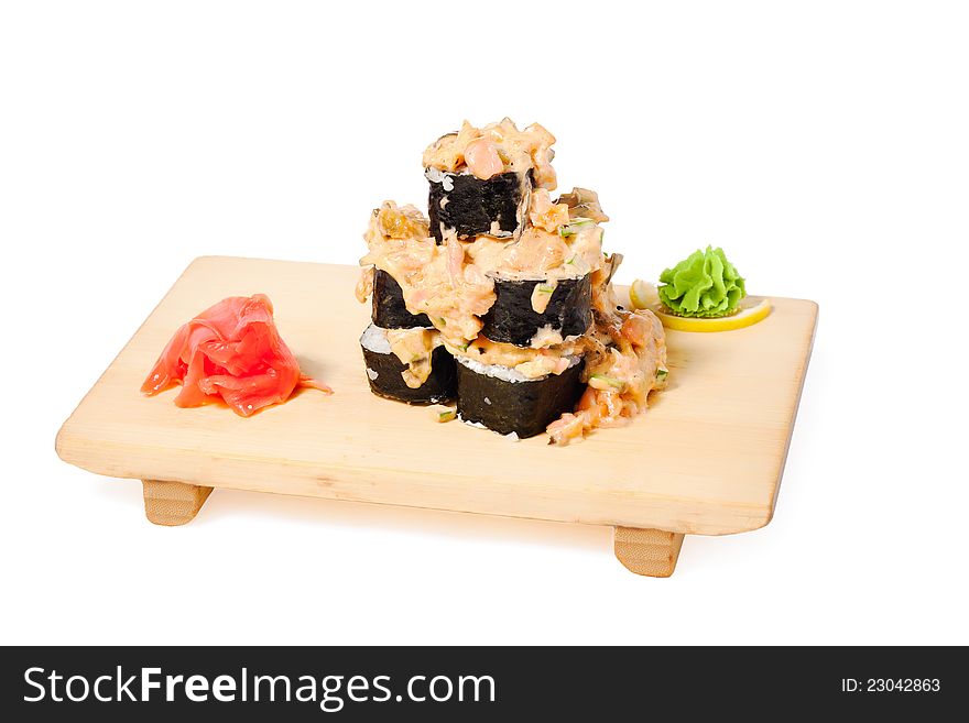 Asian food sushi on wooden plate on white background