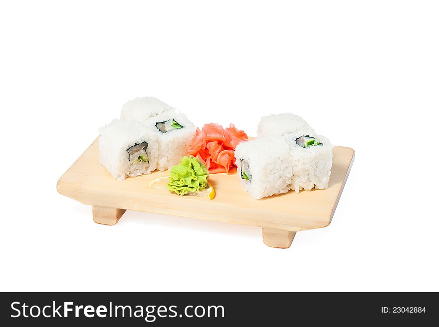 Asian food sushi on wooden plate  on white background