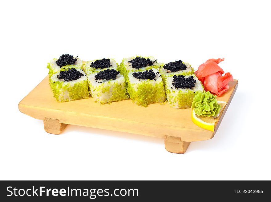 Asian food sushi on wooden plate on white background