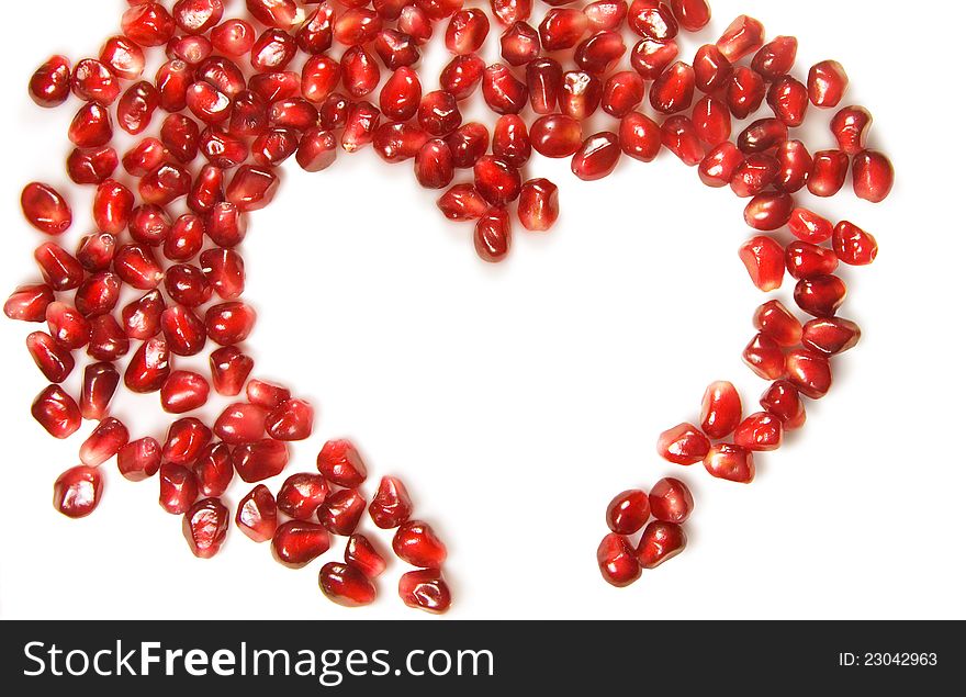 Heart of the garnet grains on a white background