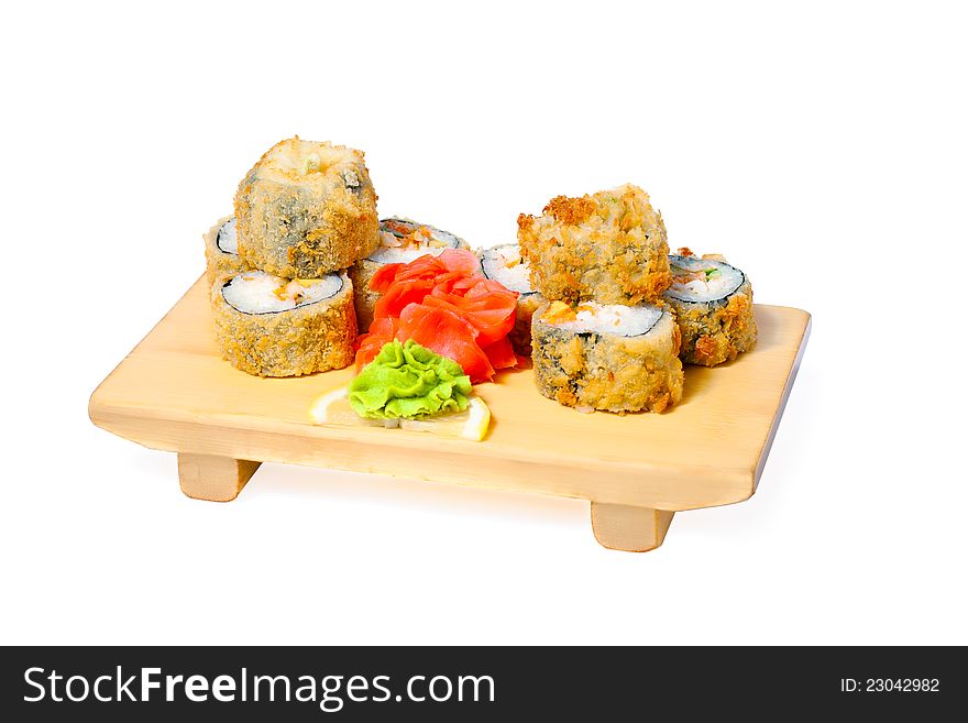 Asian food sushi on wooden plate  on white background