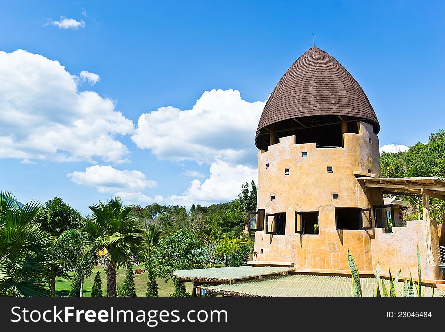 Roof of brown house with blue sky in sunny day. Roof of brown house with blue sky in sunny day