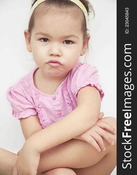 Portrait of Asian girl on a white background