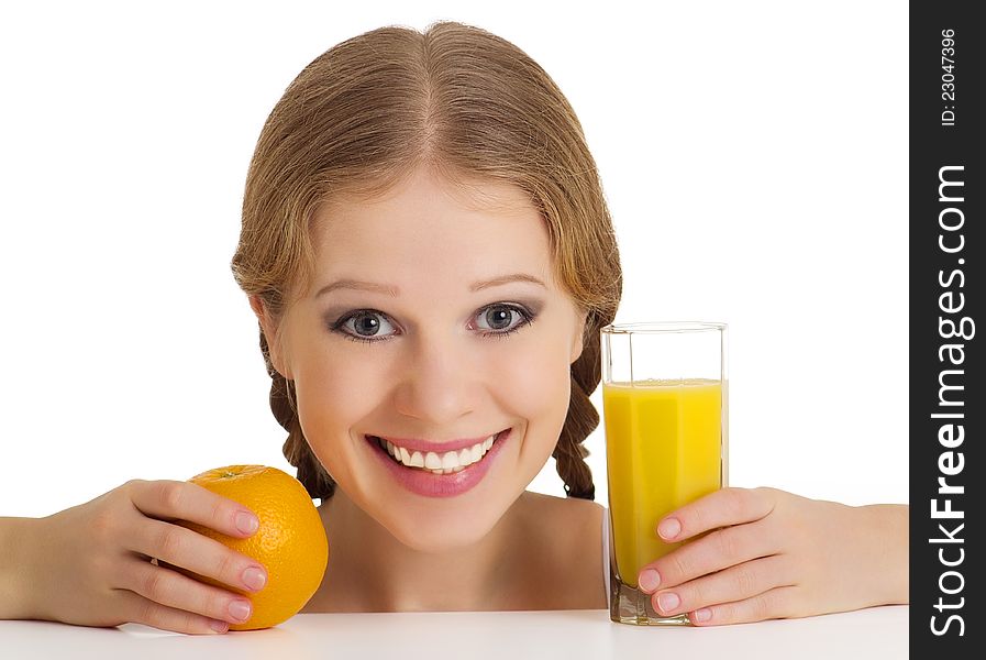 Beautiful happy cheerful girl with orange juice isolated on white background