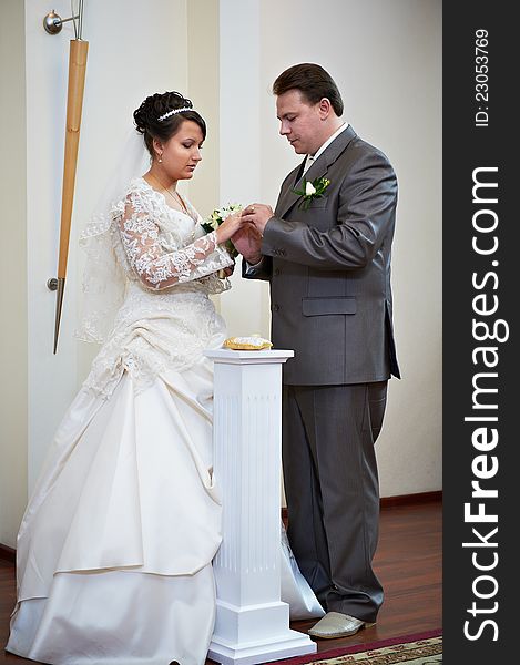 Elegant Groom Wears Wedding Ring Happy Bride