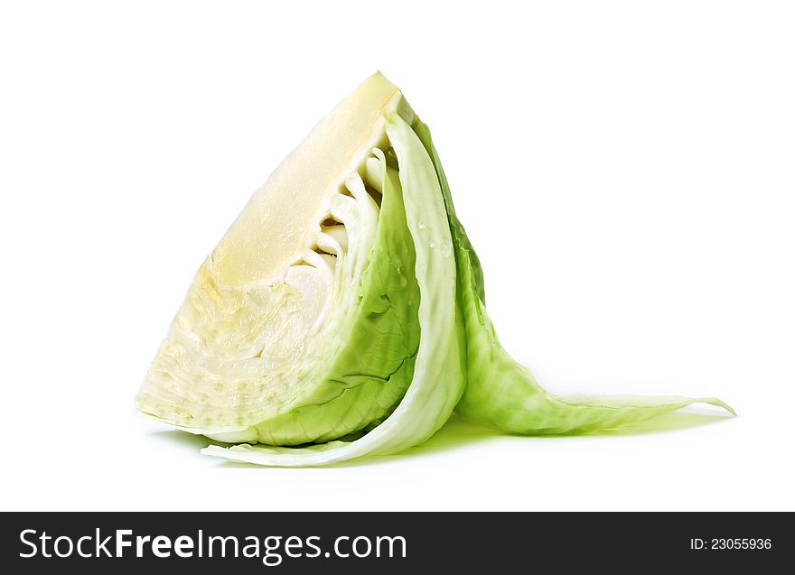 Cut cabbage on white surface. Cut cabbage on white surface.