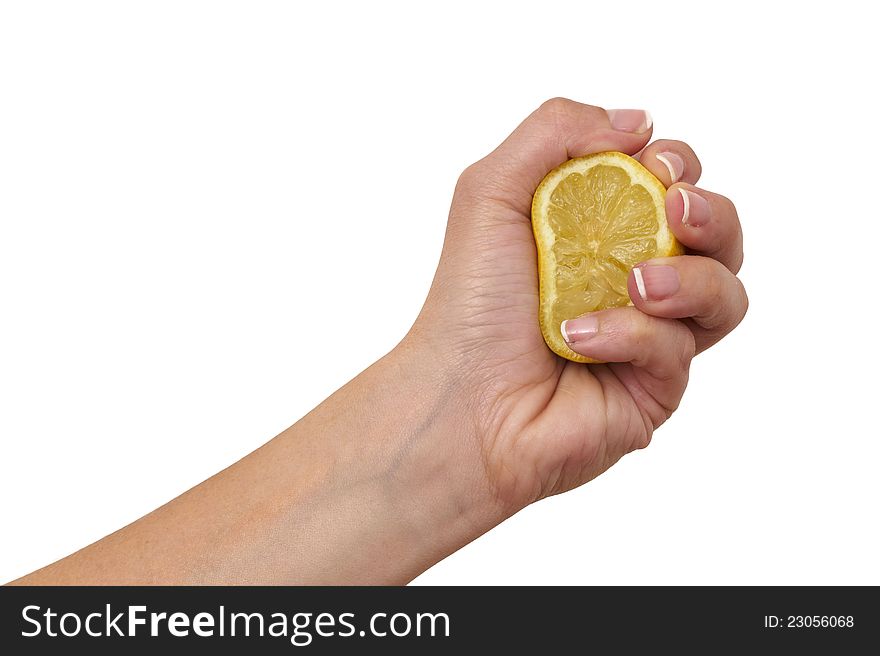 Young woman squeezing lemon on white bacground