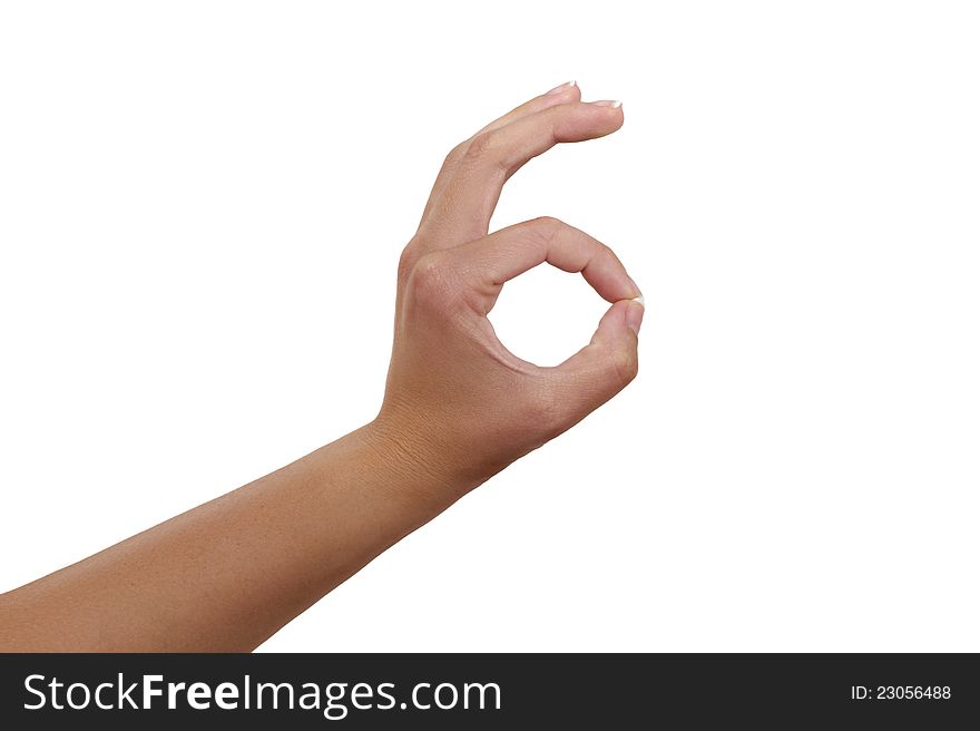 Woman's Hand with sign OK on white  bacground. Woman's Hand with sign OK on white  bacground.