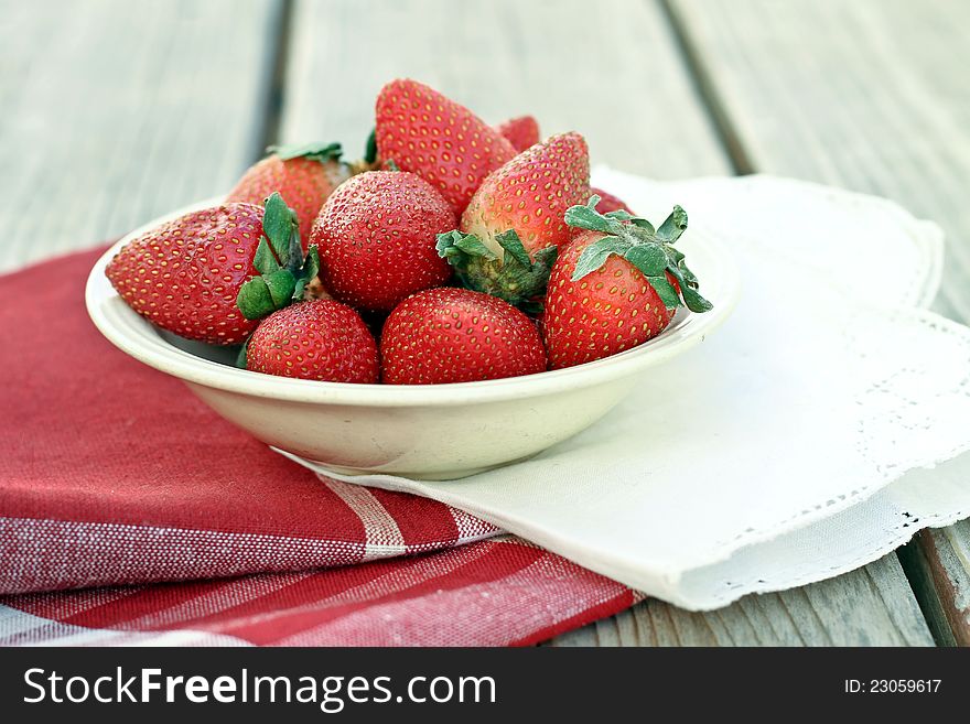 Strawberries in a white bowl. Strawberries in a white bowl.