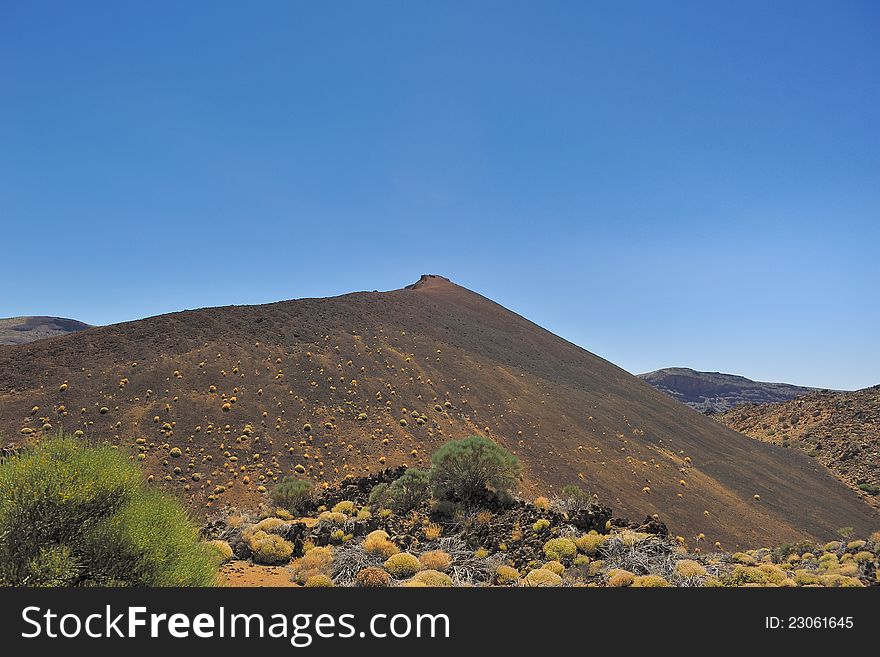 Volcanic ash hill, National Park of Las Canadas of Teide, island Tenerife. Volcanic ash hill, National Park of Las Canadas of Teide, island Tenerife.