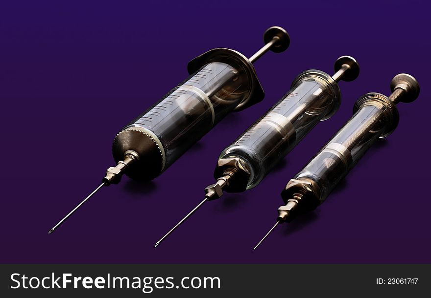 Three Glass Syringes