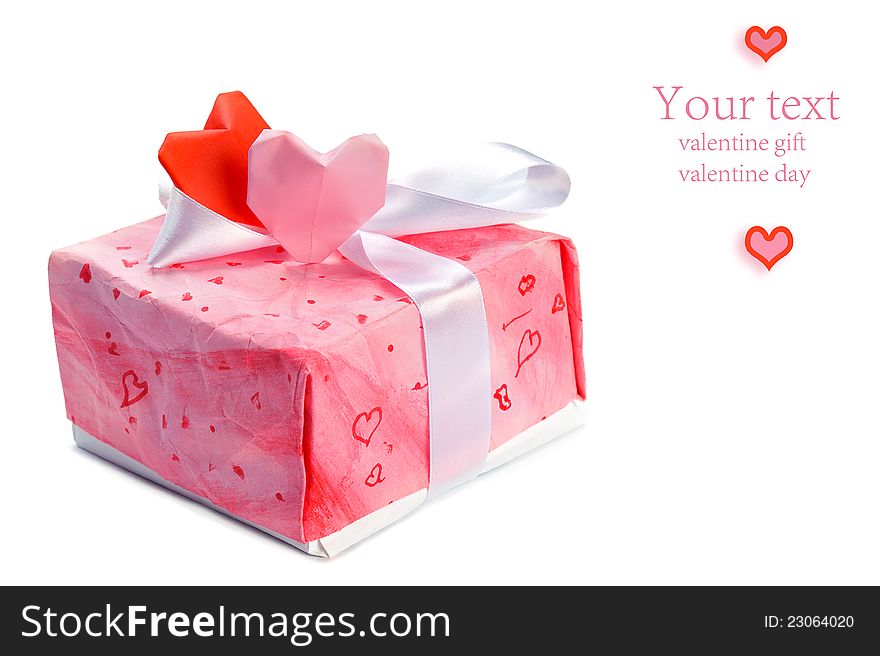 Nandmade pink gift box witn hearts isolated on white background. Nandmade pink gift box witn hearts isolated on white background