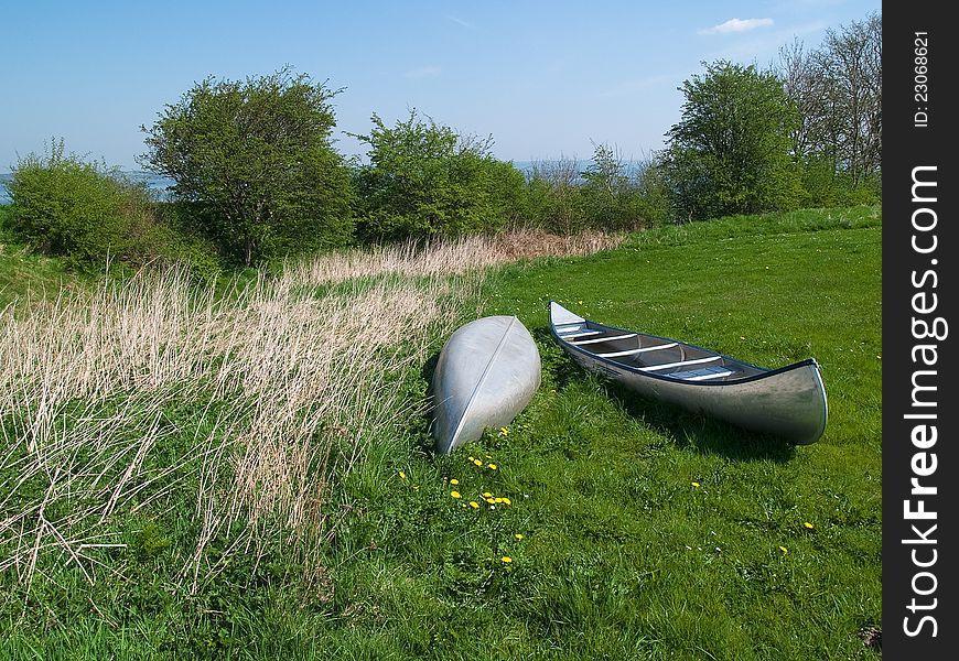 Canoes on the shore ready for extreme sport action activity. Canoes on the shore ready for extreme sport action activity