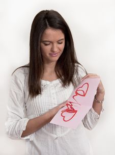Young Girl With Card With Pop Up Hearts Stock Photography