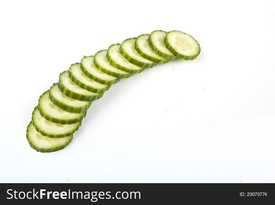 Sliced â€‹â€‹cucumber slices on white background. Sliced â€‹â€‹cucumber slices on white background