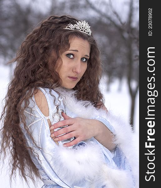 Frozen girl dressed as Snow Maiden cold winter. Frozen girl dressed as Snow Maiden cold winter