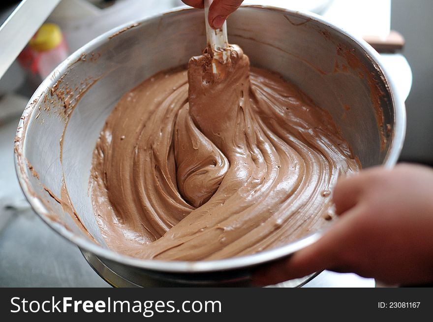 Bakers are mixing chocolate sauce