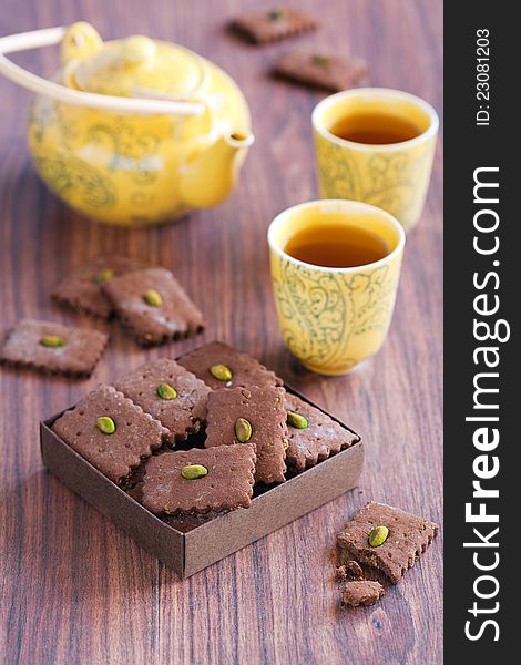 Chocolate and pistachio cookies, selective focus