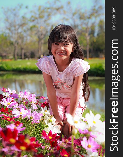 Little girl with Flowers field