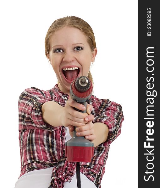 Cheerful girl with cordless drill isolated on white background