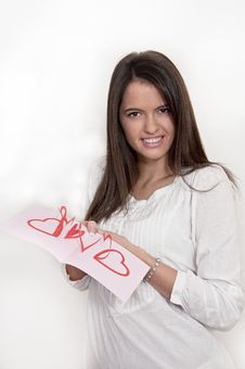 Young Girl With Card With Pop Up Hearts Royalty Free Stock Image