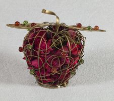 Iron Apple Sachet With Dried Flowers Royalty Free Stock Photography