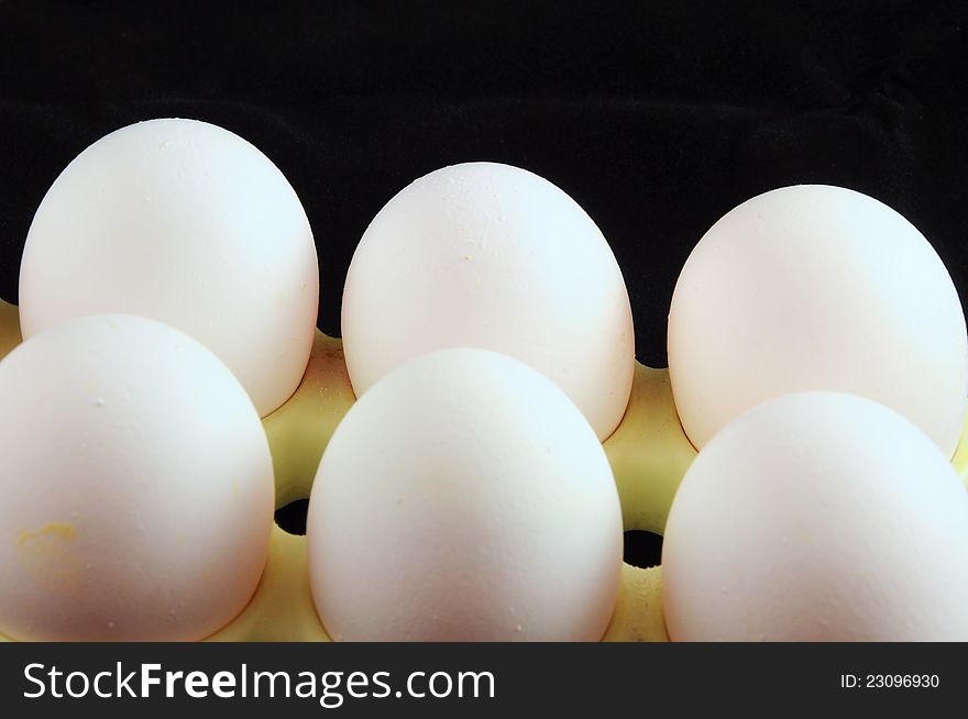 Some white eggs against black