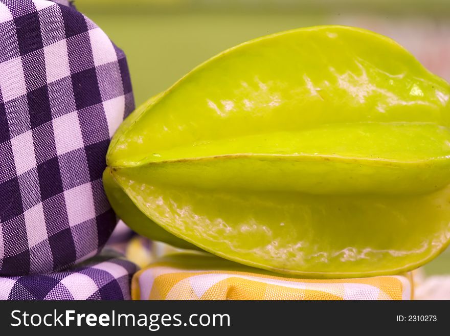 Isolated tropical fruit carambola on a fruitshop.