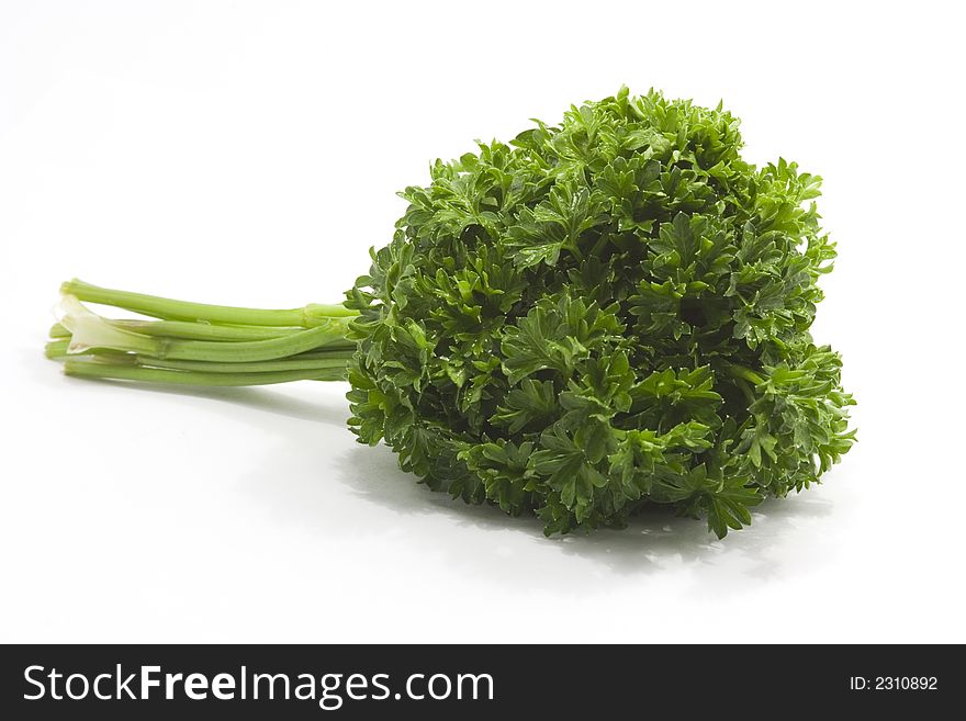 Fresh curvy parsley isolated on white