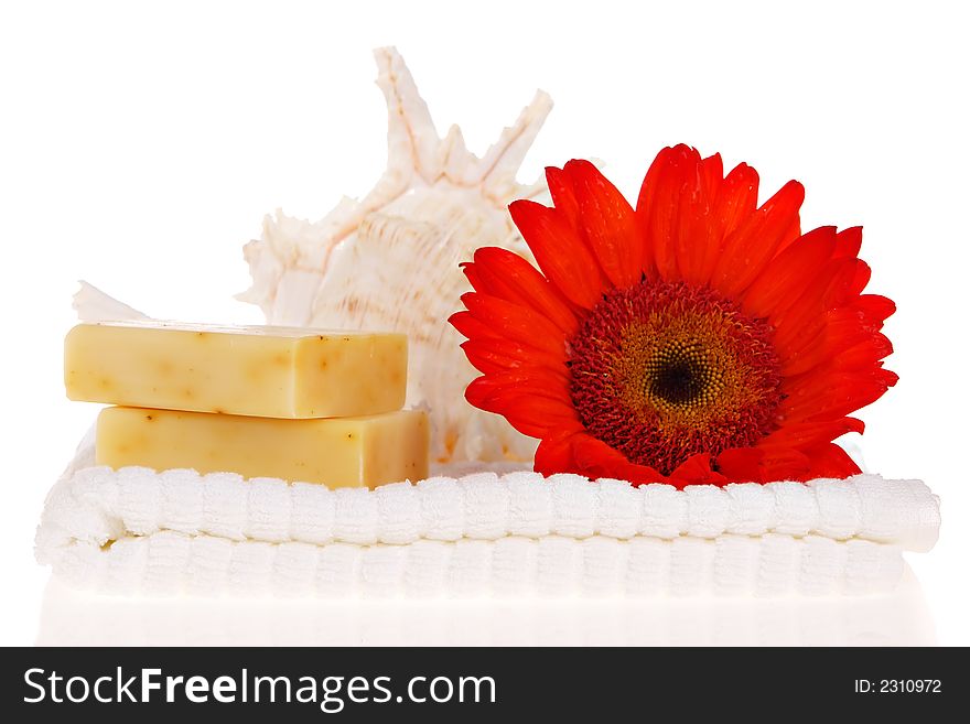 Soap bars, towel, and red flower. Soap bars, towel, and red flower