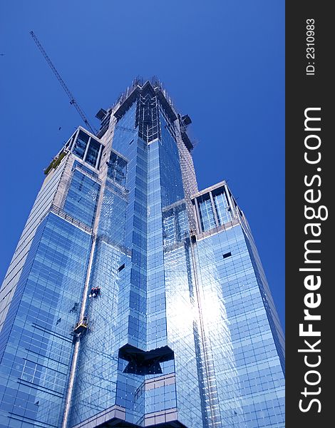 Modern building used for commercial purposes on the blue sky. Modern building used for commercial purposes on the blue sky