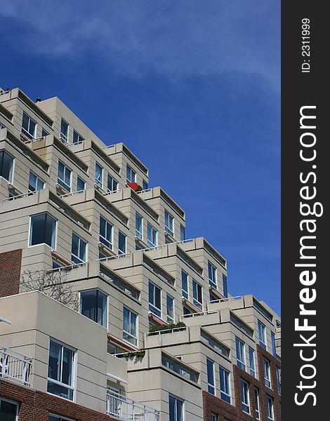 Windows and balconies on a generic, urban building. Windows and balconies on a generic, urban building.