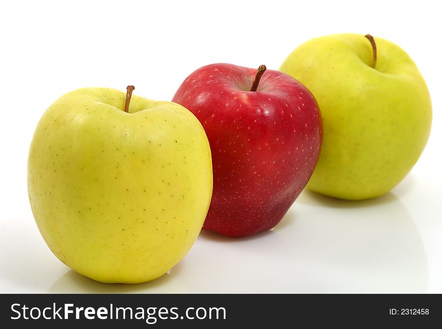 Red and green apples in white background (health concept)