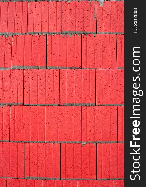 Abstract in red of tiles with grey cement pointing. Abstract in red of tiles with grey cement pointing.