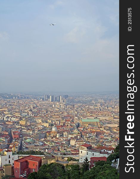 View over the town of naples, campania, italy with starting aircraft. View over the town of naples, campania, italy with starting aircraft