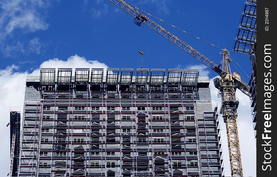 Modern building on the blue sky. Modern building on the blue sky