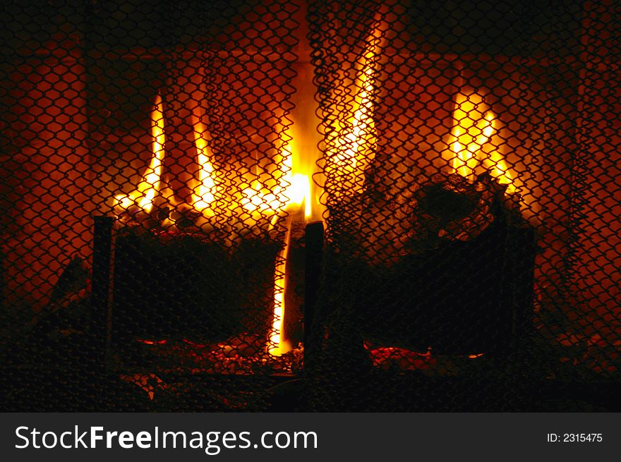 Close up of a fire burning in a fireplace