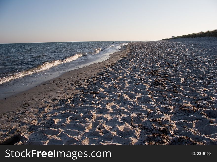 Coastline with surf at baltic sea, germany