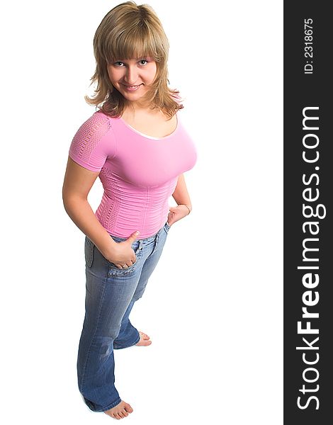 Portrait of a beautiful sexy girl wearing pink top and blue jeans