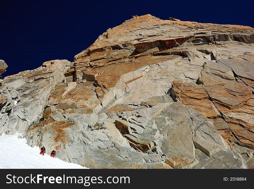 Climbers in front of the south face of Aiguille du Midi, Chamonix, Mont Blanc, West Alps, France, europe. Climbers in front of the south face of Aiguille du Midi, Chamonix, Mont Blanc, West Alps, France, europe