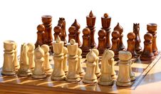 Isolated  Chessset Figurines On Playing Board Royalty Free Stock Photos