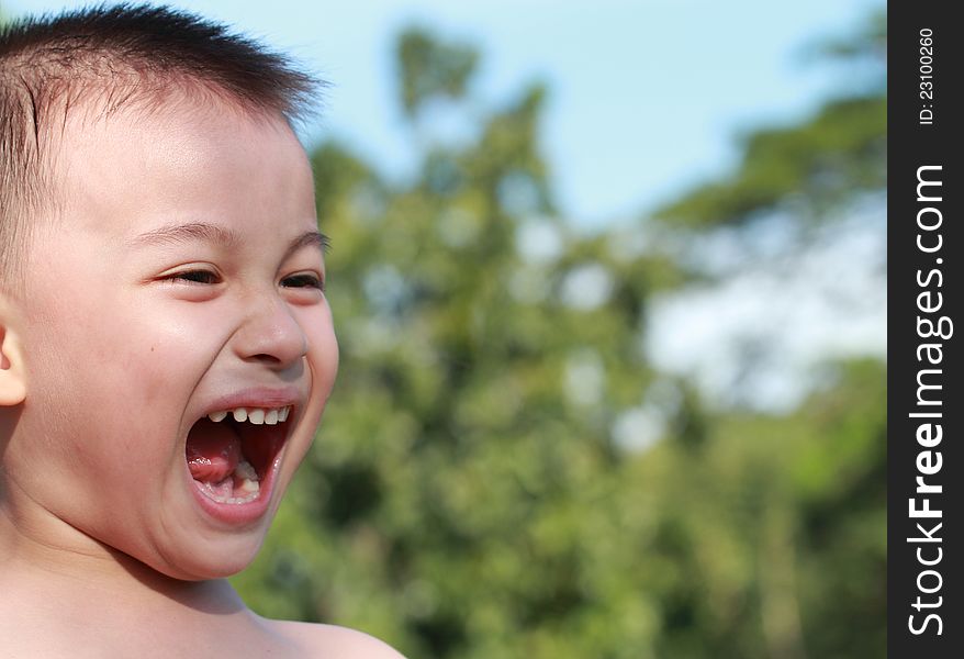 Happy little boy, The boy laughed happily