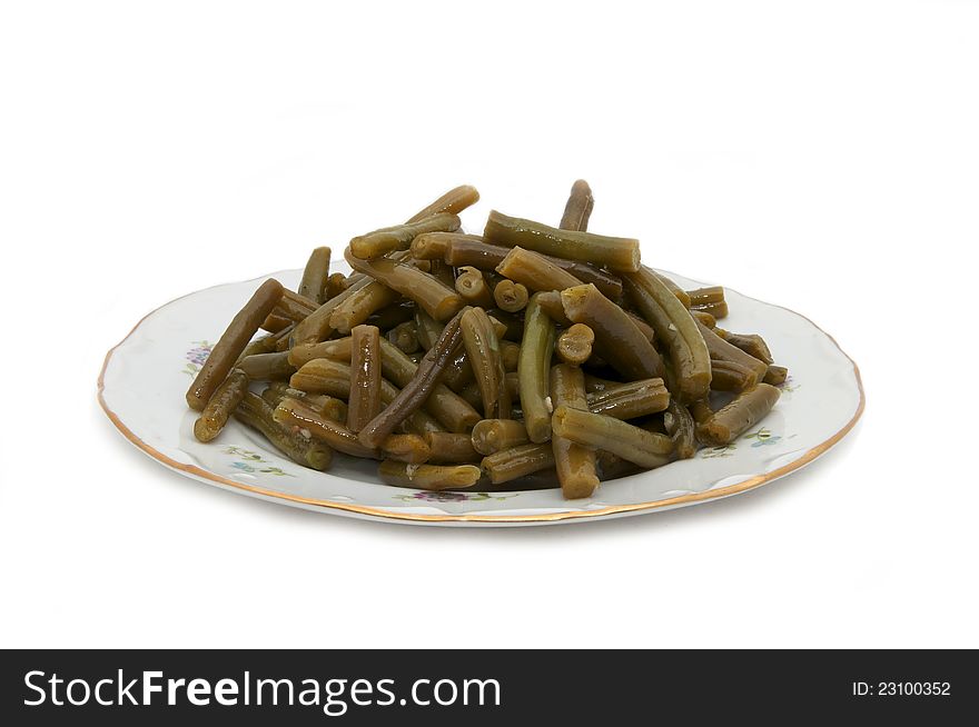 Dish a spicy salad of asparagus on a white background. Dish a spicy salad of asparagus on a white background