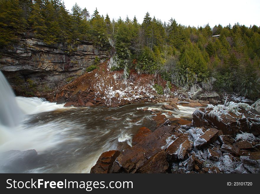 Waterfalls in the mountains in winter with silky flow. Waterfalls in the mountains in winter with silky flow