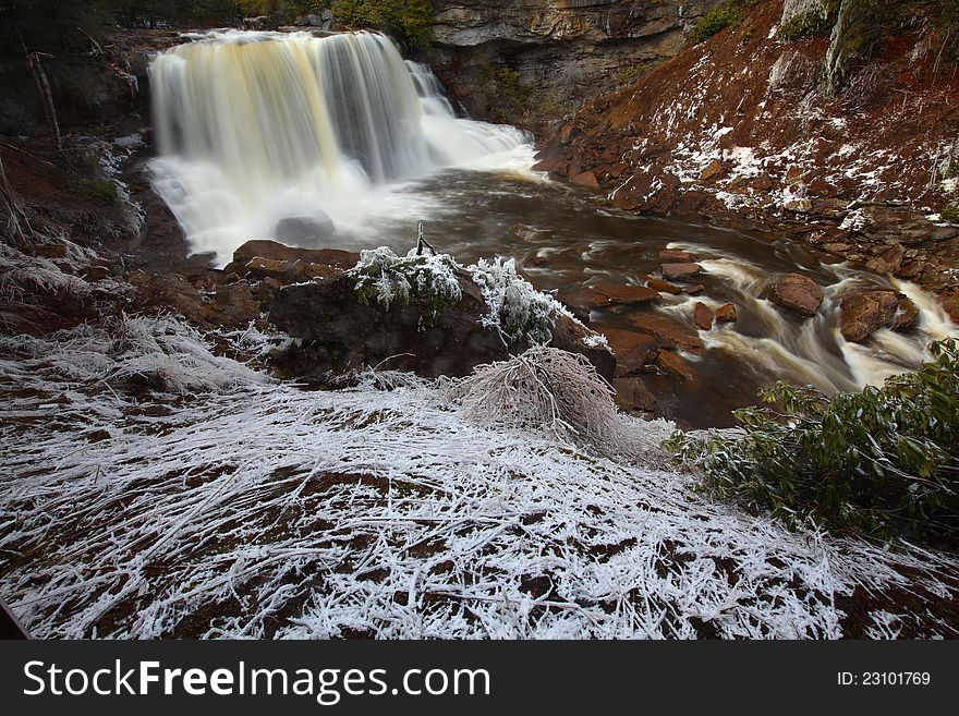 Waterfalls in the mountains in winter with silky flow. Waterfalls in the mountains in winter with silky flow