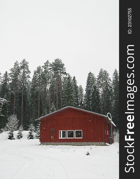 Traditional Finnish Cottage In The Winter