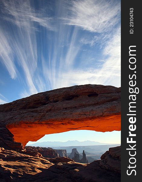 Mesa arch glowing red at sunrise in canyonlands national park. Mesa arch glowing red at sunrise in canyonlands national park