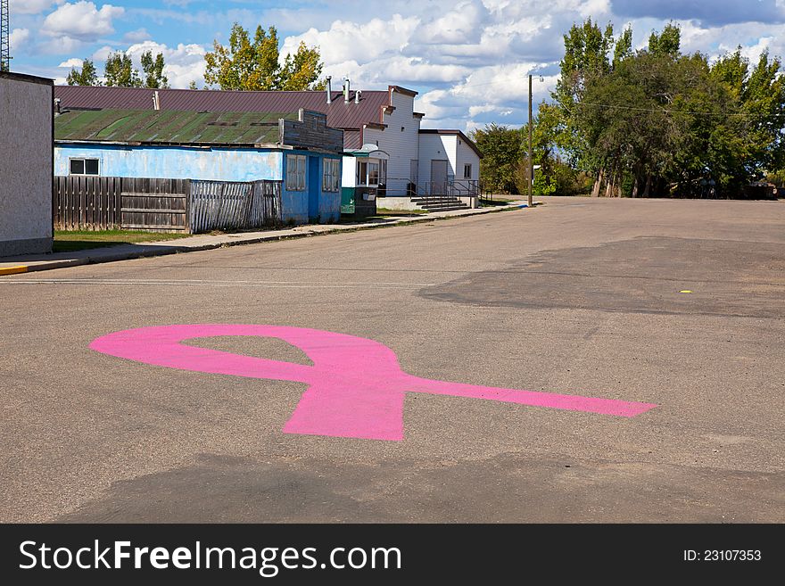 Cereal, Alberta, Canada. The little town with heart. A pink ribbon for breast cancer is painted in the center of main street in this quiet, rustic small prairie town.