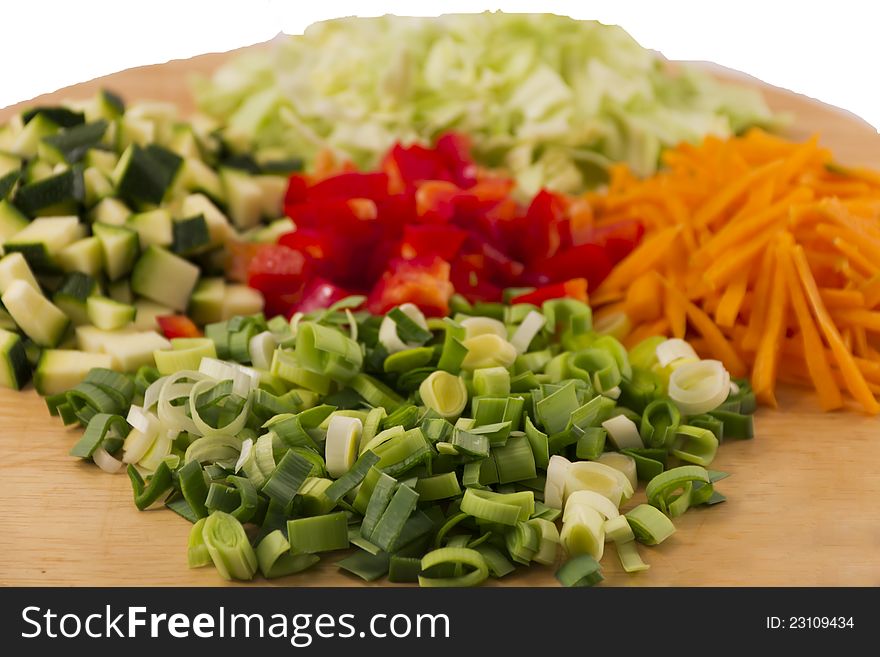 Vegetable on wooden plate,  on white