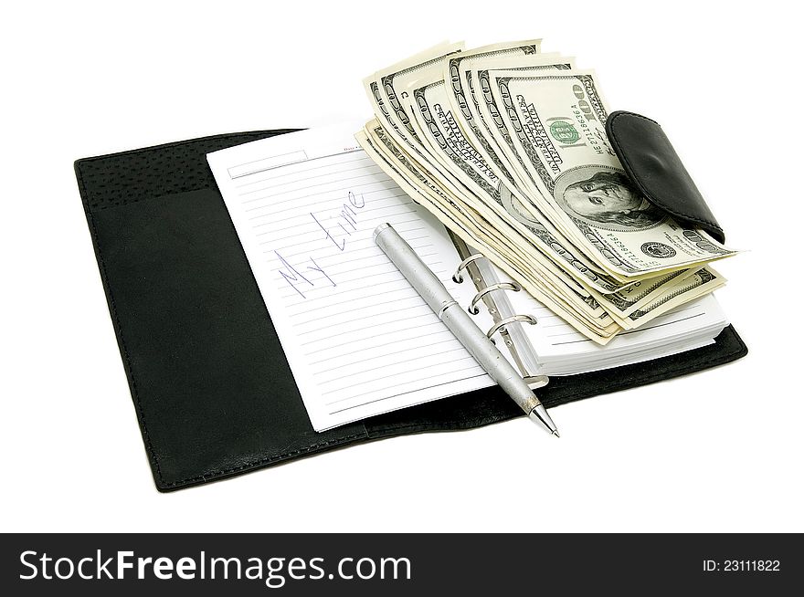 Notebook and notes of dollars on white background. Notebook and notes of dollars on white background